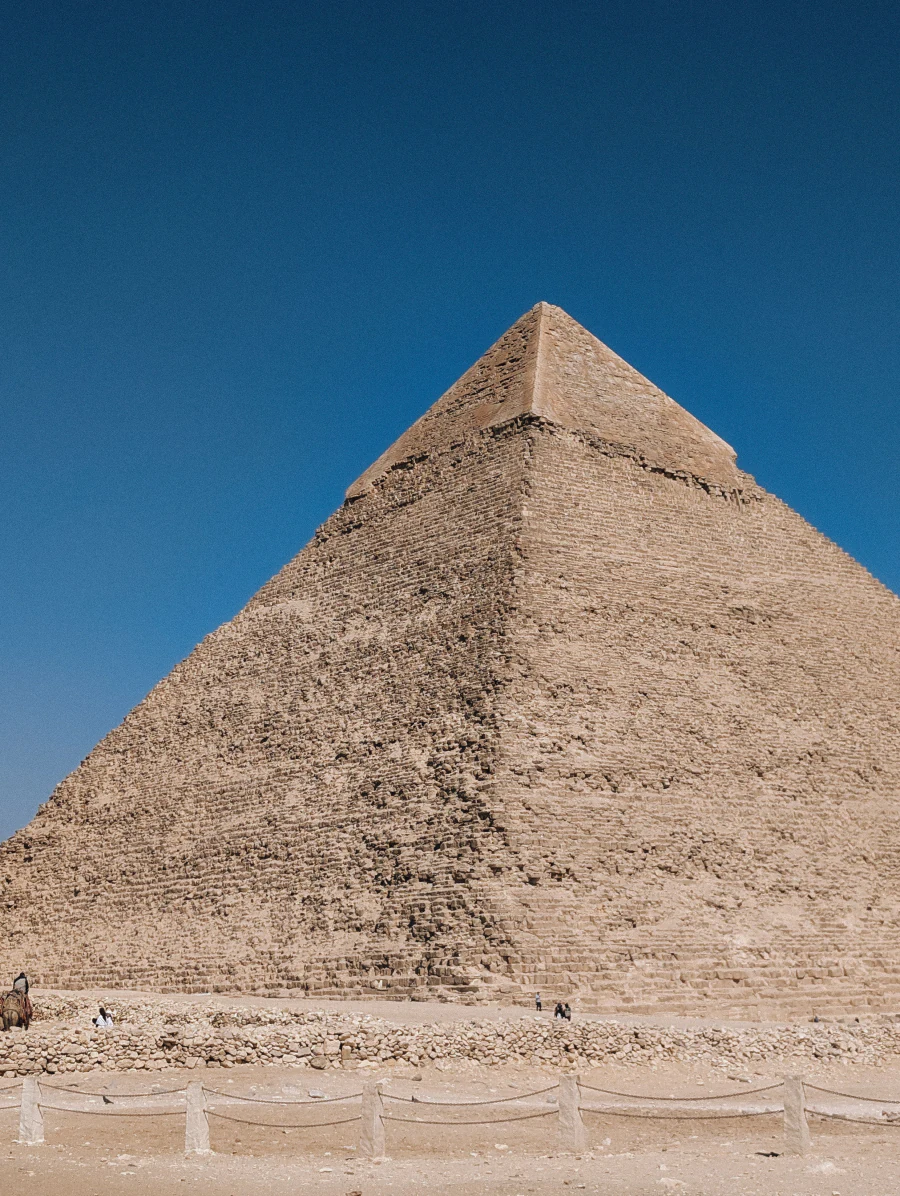 A pyramid beneath a clear blue sky